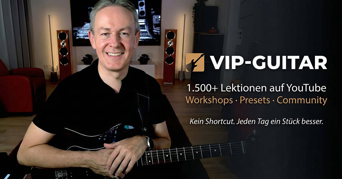 Horst Keller mit Gitarre im VIP-Guitar Studio